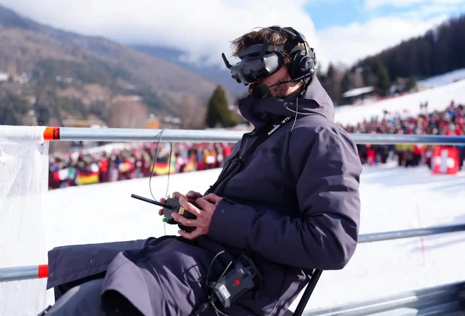 Drone pilot controlling camera during Olympic event